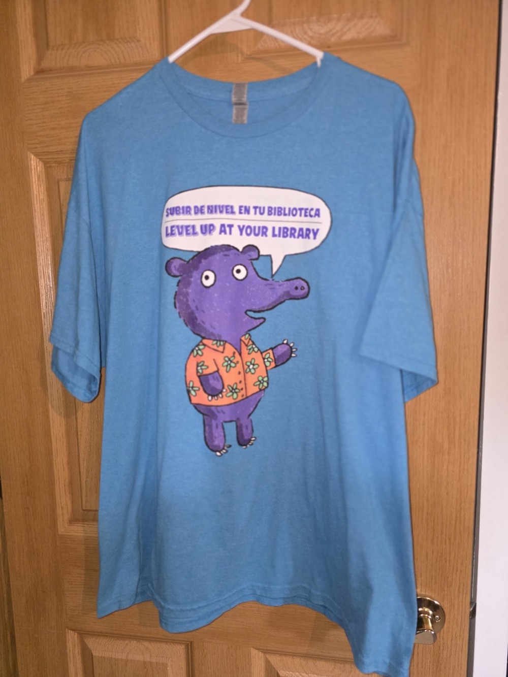 Gildan Turquoise Adult Tee with Purple Character Graphic